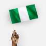 Person waving the flag of Federal Republic of Nigeria